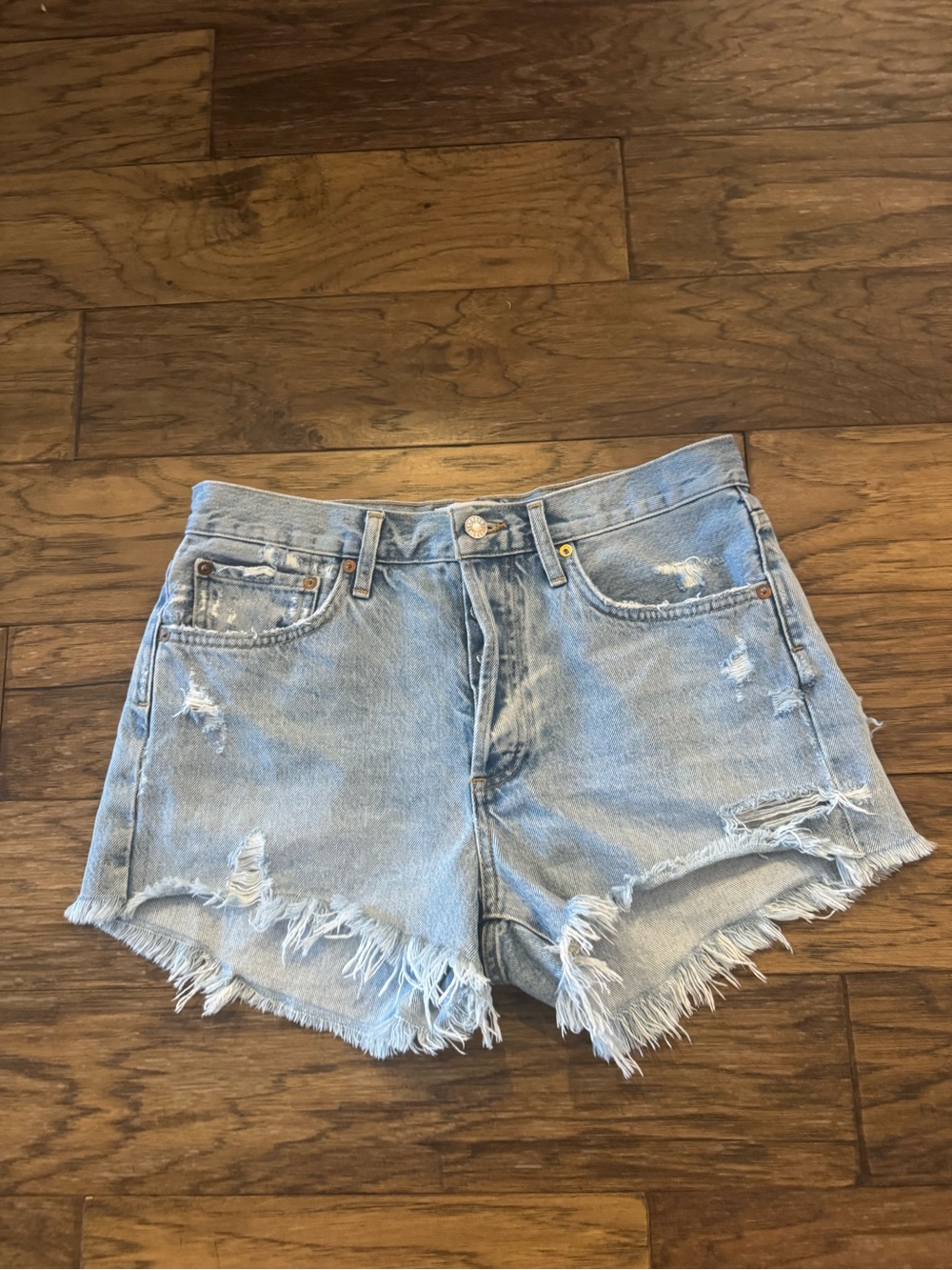 Agolde Light Blue Distressed Denim Cutoff Shorts